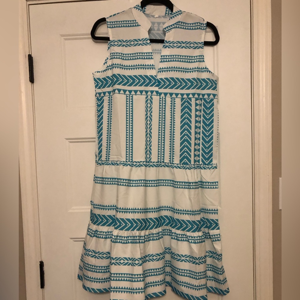 Tank dress with a v neck size medium bought on Amazon no brand tag listed.